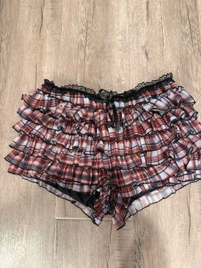 Fashion Nova Ruffled Plaid Shorts in Red and Black
